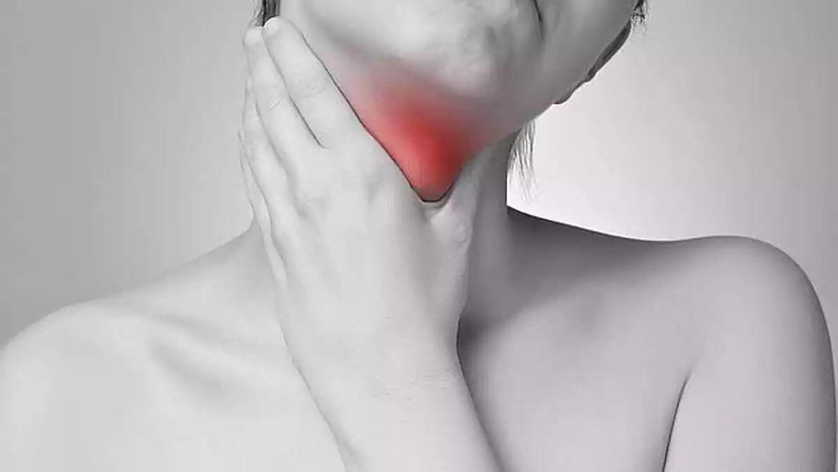 A woman with neck pain