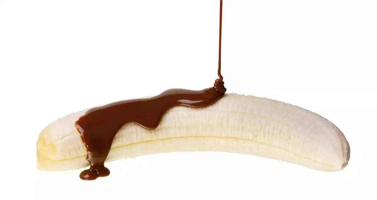 Banana with chocolate syrup