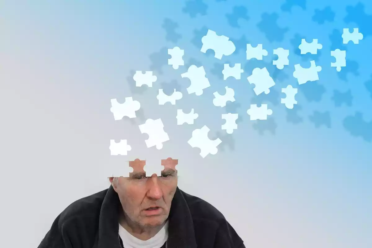 An old man with puzzle pieces in his head